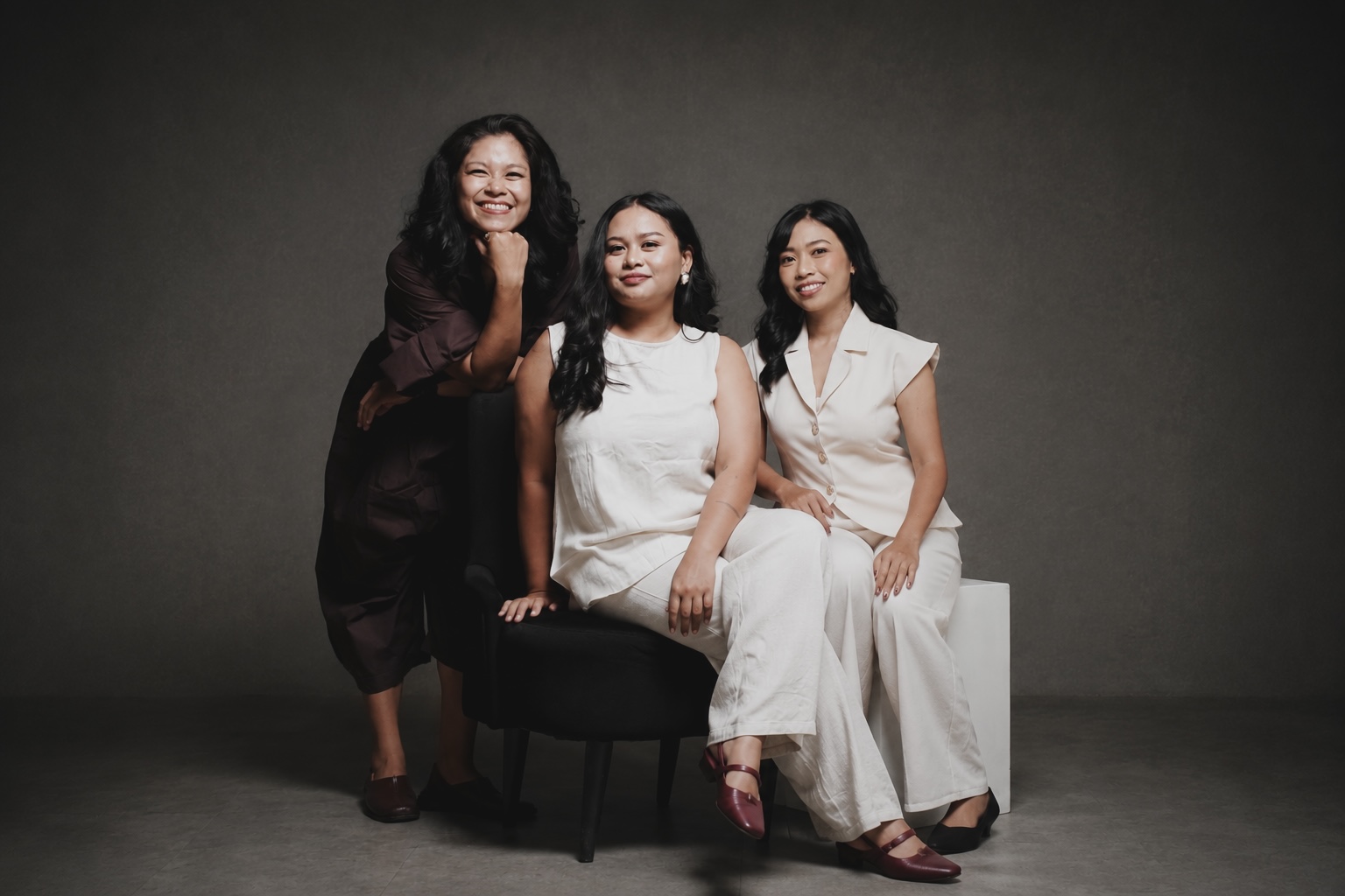 The About Wedding planning team in a Bali studio